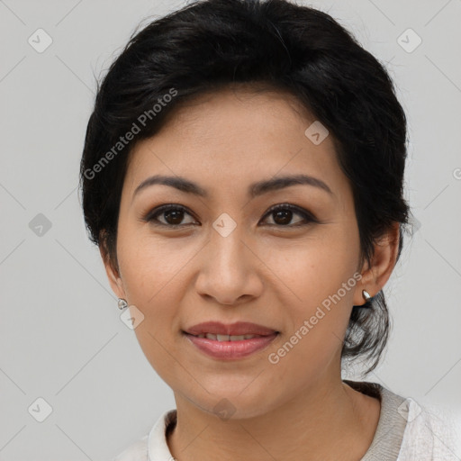 Joyful asian young-adult female with short  brown hair and brown eyes