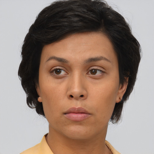 Neutral asian young-adult female with medium  brown hair and brown eyes