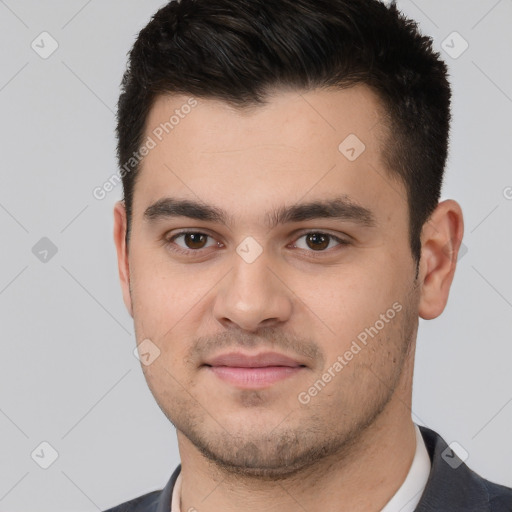 Joyful white young-adult male with short  brown hair and brown eyes