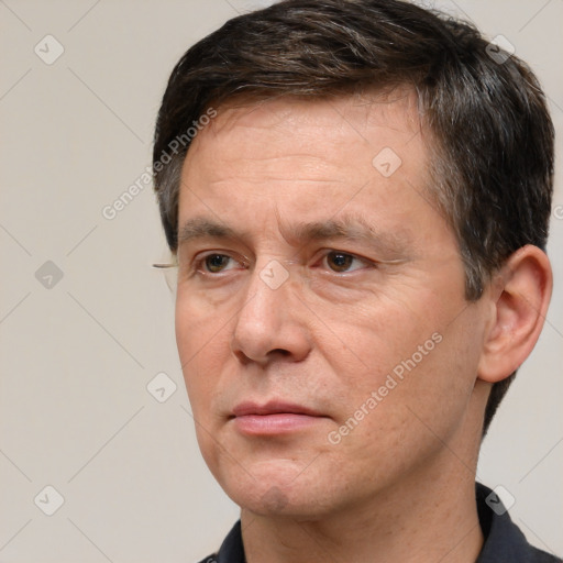 Neutral white adult male with short  brown hair and brown eyes