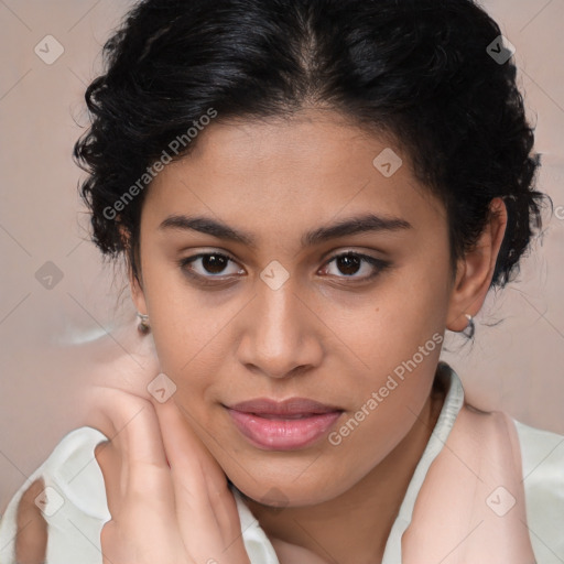 Joyful latino young-adult female with medium  brown hair and brown eyes