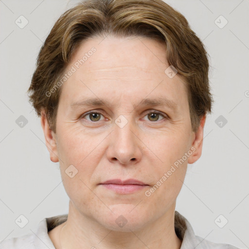 Joyful white adult male with short  brown hair and grey eyes