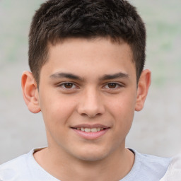 Joyful white child male with short  brown hair and brown eyes