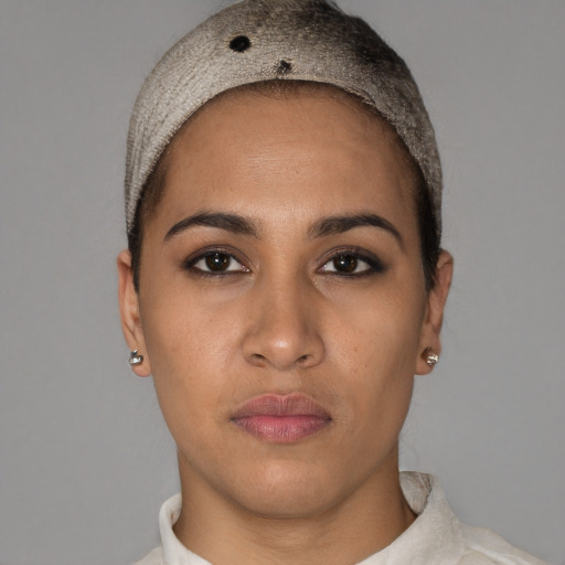 Neutral white young-adult female with short  black hair and brown eyes
