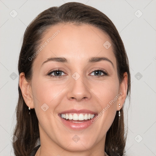 Joyful white young-adult female with medium  brown hair and grey eyes