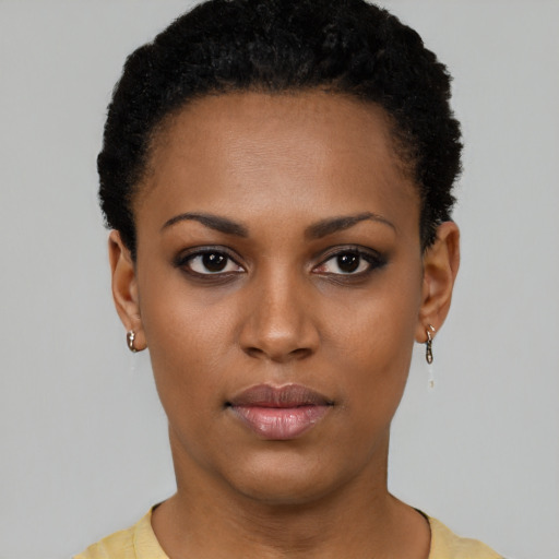 Neutral black young-adult female with short  black hair and brown eyes