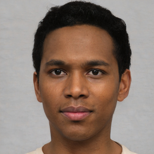Neutral black young-adult male with short  black hair and brown eyes