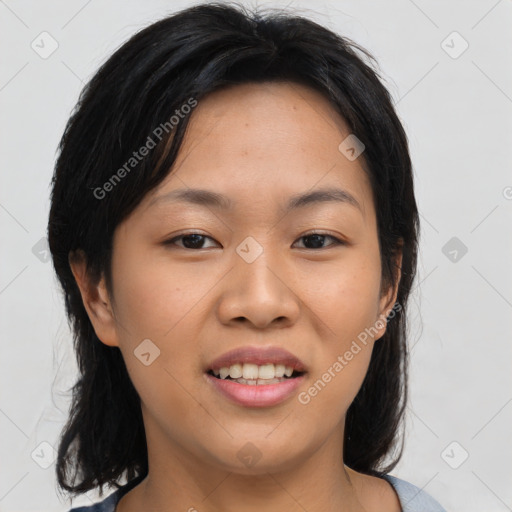 Joyful asian young-adult female with medium  black hair and brown eyes