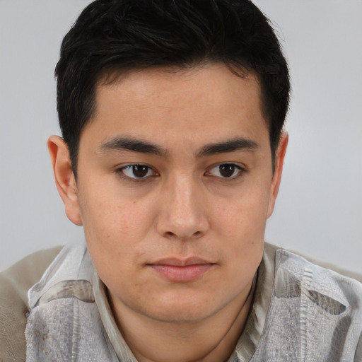 Neutral asian young-adult male with short  brown hair and brown eyes