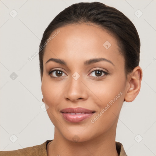 Joyful latino young-adult female with short  brown hair and brown eyes