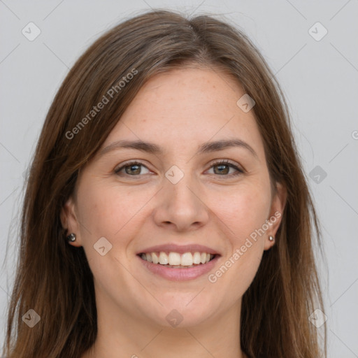 Joyful white young-adult female with long  brown hair and grey eyes