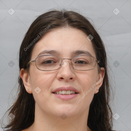 Joyful white adult female with long  brown hair and brown eyes