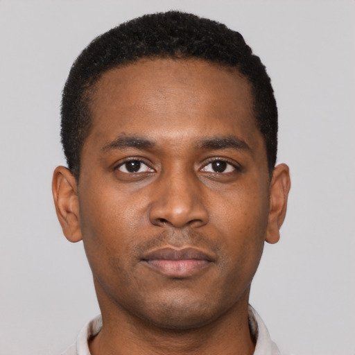 Neutral black young-adult male with short  brown hair and brown eyes