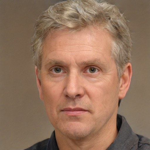 Neutral white middle-aged male with short  brown hair and brown eyes