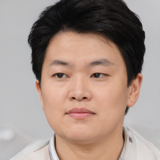 Neutral asian young-adult male with short  black hair and brown eyes