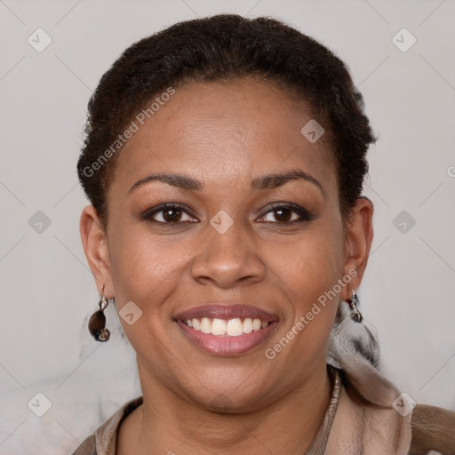 Joyful latino young-adult female with short  brown hair and brown eyes