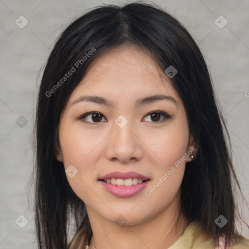 Joyful asian young-adult female with long  brown hair and brown eyes