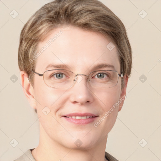 Joyful white adult female with short  brown hair and grey eyes