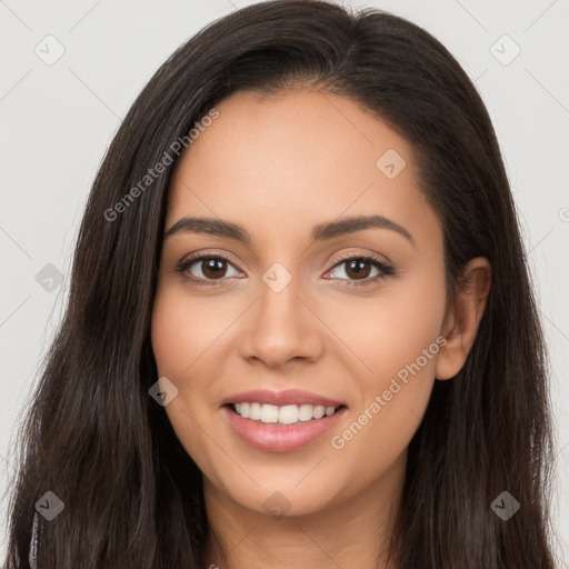 Joyful white young-adult female with long  brown hair and brown eyes