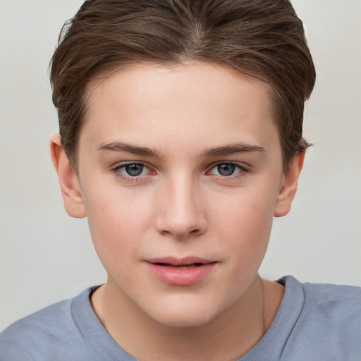 Joyful white child female with short  brown hair and brown eyes