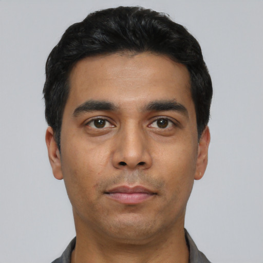 Neutral asian young-adult male with short  black hair and brown eyes