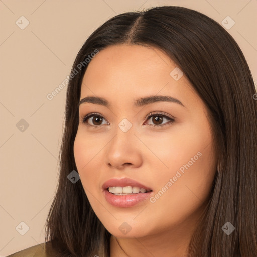 Joyful white young-adult female with long  brown hair and brown eyes