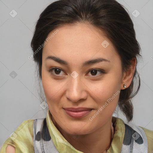 Joyful latino young-adult female with medium  brown hair and brown eyes