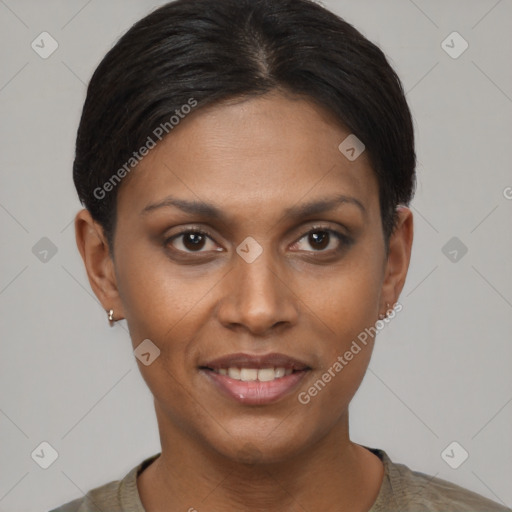 Joyful black young-adult female with short  brown hair and brown eyes
