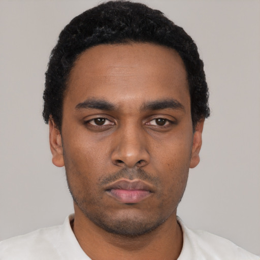 Neutral black young-adult male with short  black hair and brown eyes