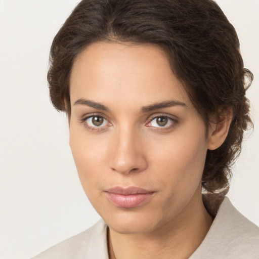 Neutral white young-adult female with medium  brown hair and brown eyes