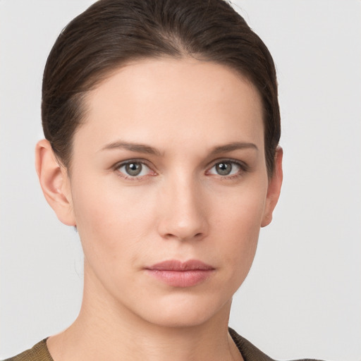 Neutral white young-adult female with short  brown hair and brown eyes