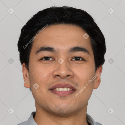 Joyful asian young-adult male with short  black hair and brown eyes