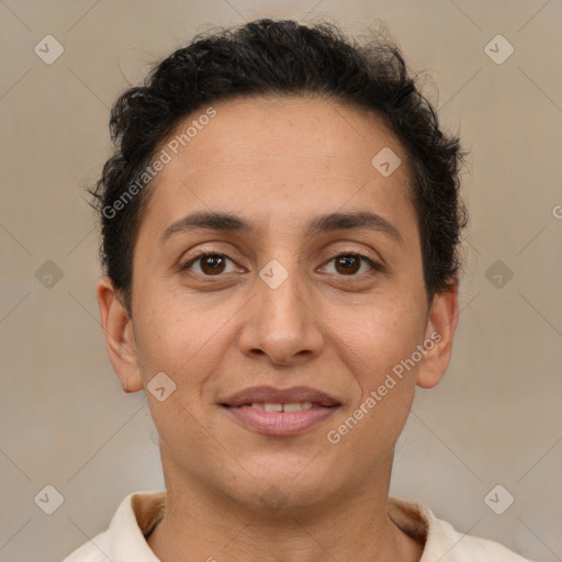 Joyful white adult female with short  brown hair and brown eyes