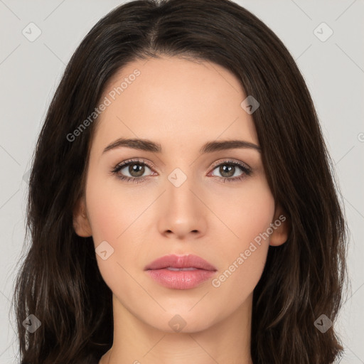 Neutral white young-adult female with long  brown hair and brown eyes