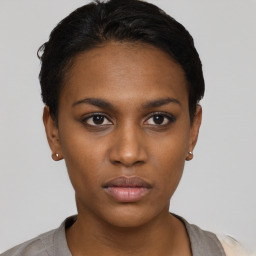 Neutral black young-adult female with short  brown hair and brown eyes