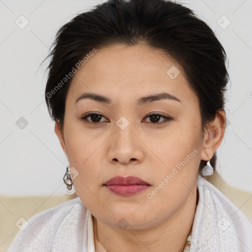 Joyful asian young-adult female with short  brown hair and brown eyes