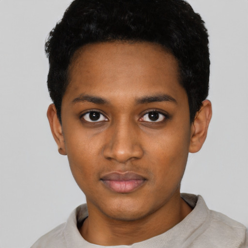 Neutral black young-adult male with short  black hair and brown eyes