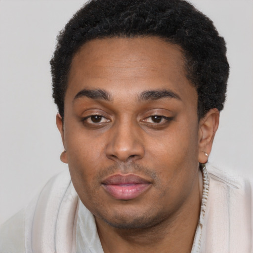 Neutral black young-adult male with short  brown hair and brown eyes