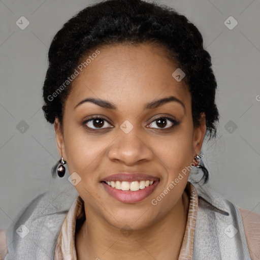 Joyful black young-adult female with long  brown hair and brown eyes