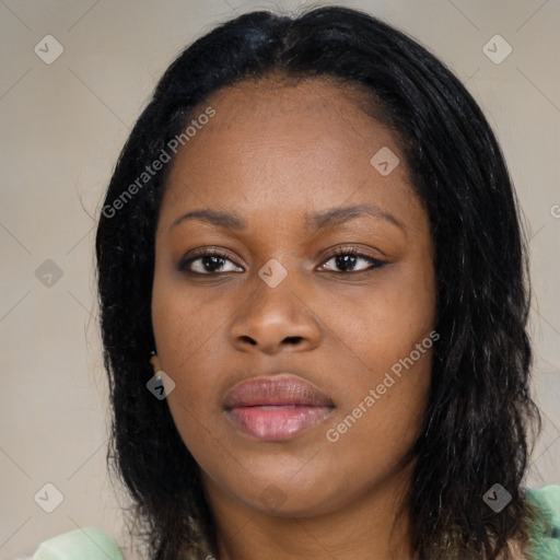 Joyful black young-adult female with medium  black hair and brown eyes