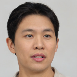 Neutral asian young-adult male with short  brown hair and brown eyes