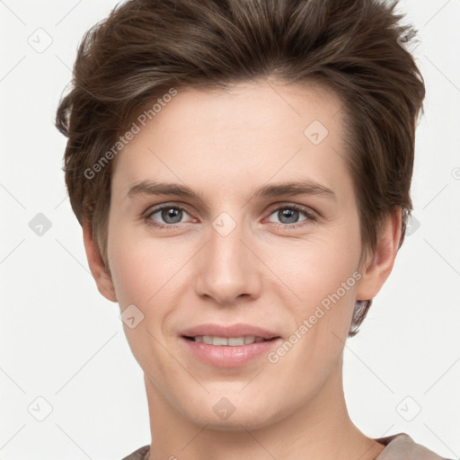 Joyful white young-adult female with short  brown hair and grey eyes