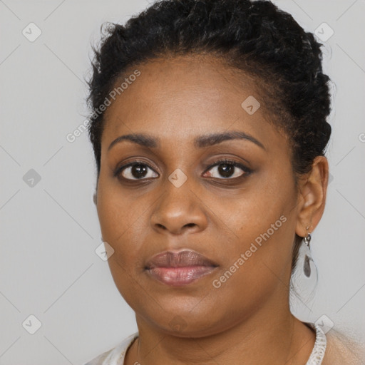 Neutral black young-adult female with short  brown hair and brown eyes