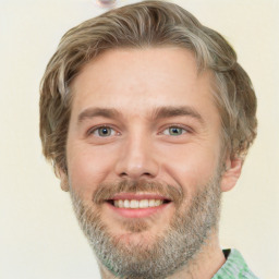 Joyful white adult male with short  brown hair and grey eyes