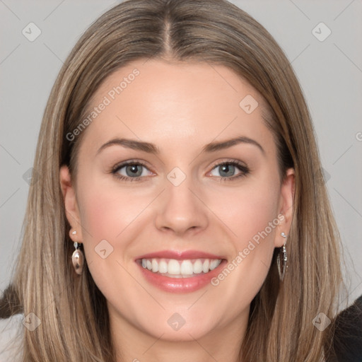 Joyful white young-adult female with long  brown hair and grey eyes