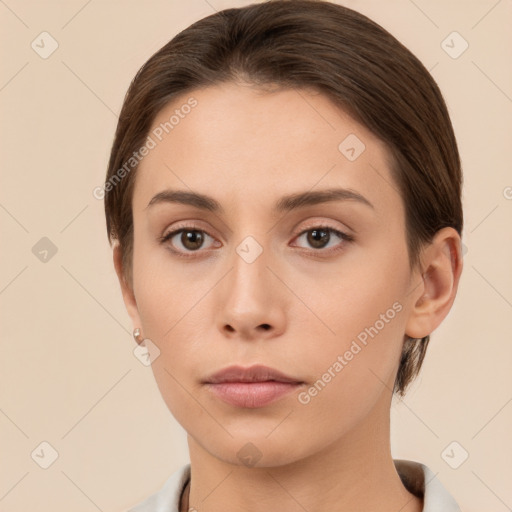 Neutral white young-adult female with short  brown hair and brown eyes