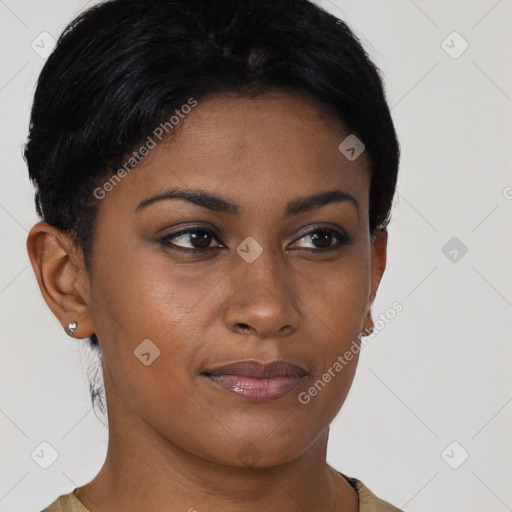 Joyful black young-adult female with short  brown hair and brown eyes