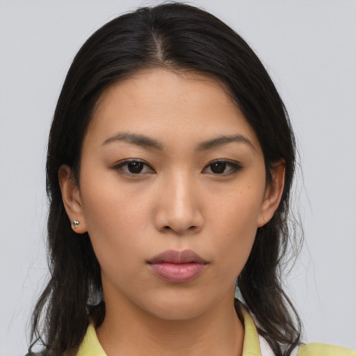 Neutral asian young-adult female with long  brown hair and brown eyes