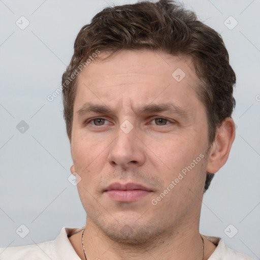 Neutral white adult male with short  brown hair and brown eyes