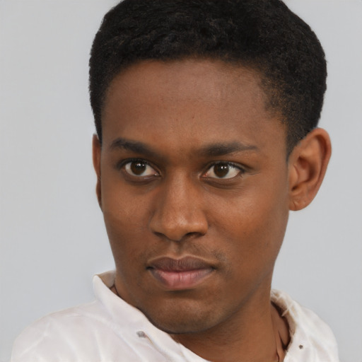 Neutral black young-adult male with short  black hair and brown eyes